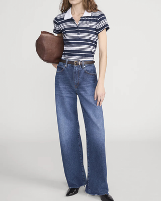 THE STRIPED POLO TOP