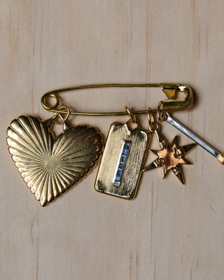 RIBBED HEART OF GOLD CHARM