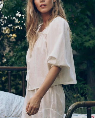 THE EYELET BUTTON SLEEP TOP
